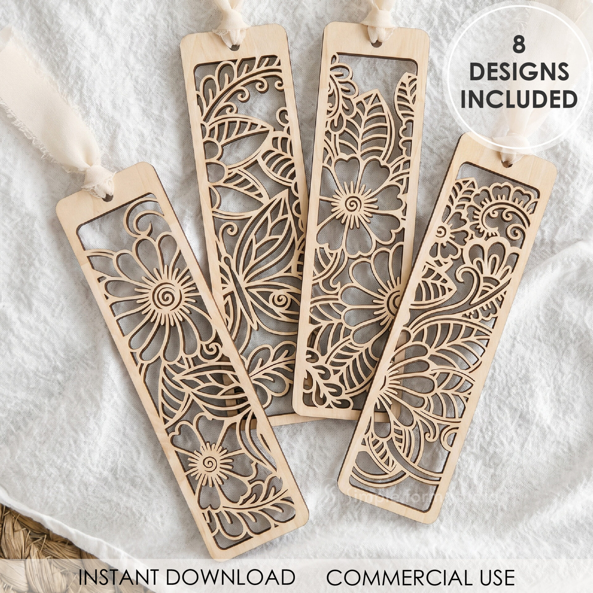 Set of 8 Ornamental Floral Bookmark SVG designs laser cut from light wood with intricate botanical cutouts displayed on a neutral styled background